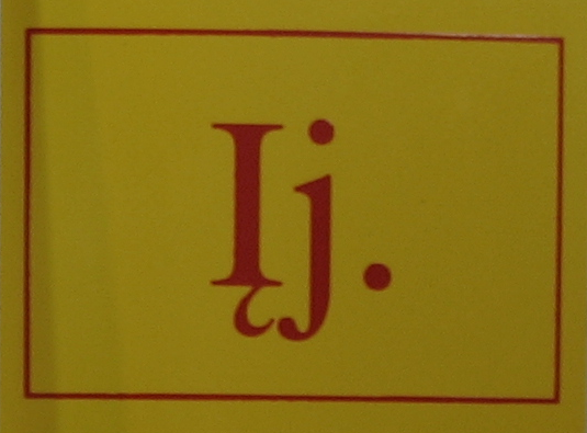Ženklas lipdukas "Įj." 20x30mm (10vnt)